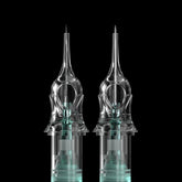 Close-up of Sai brand PMU cartridge, with transparent casing, teal internal parts, and sharp needle tip for permanent makeup